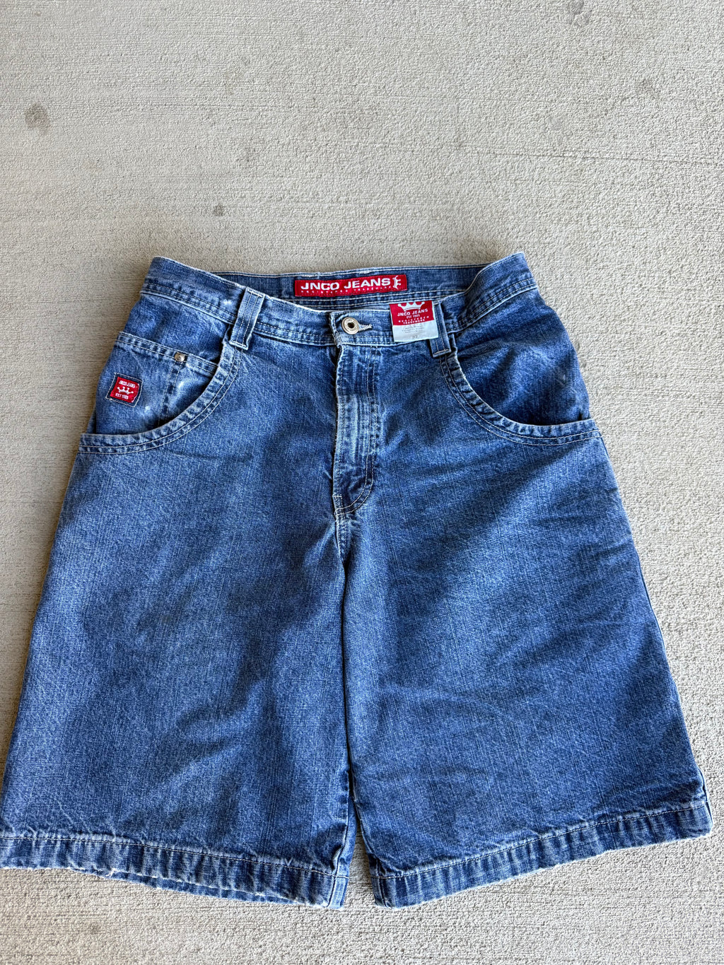 90s JNCO surfing dragon jorts