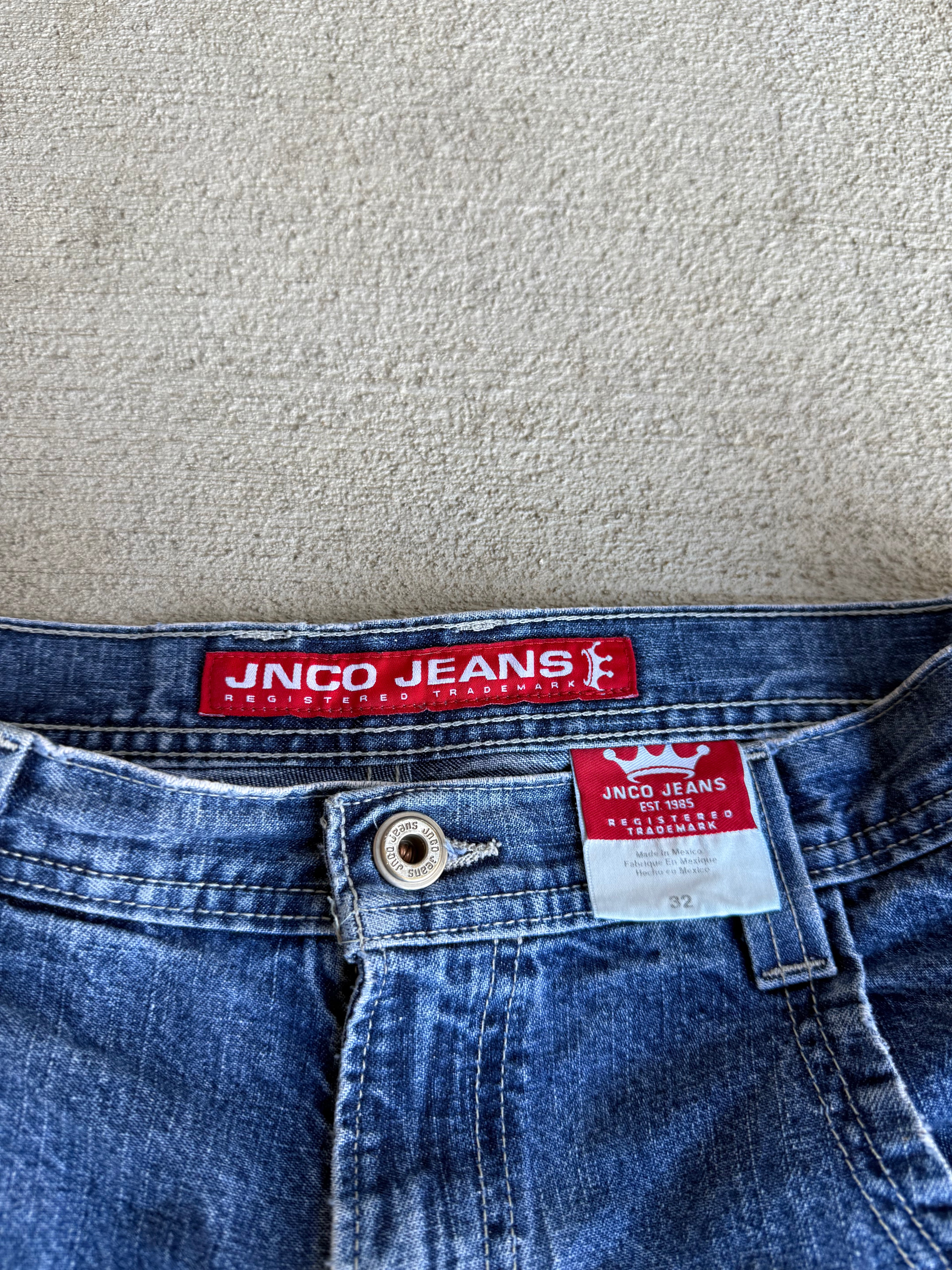 90s JNCO surfing dragon jorts